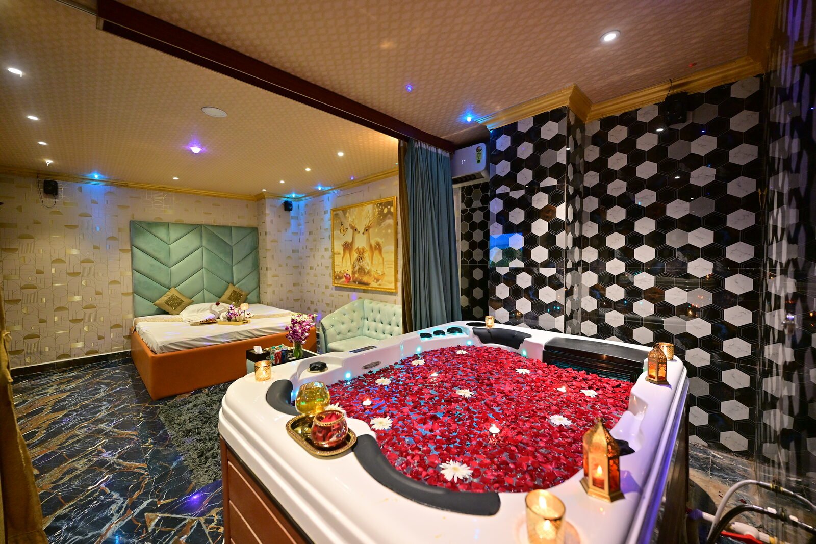 Private jacuzzi suite with rose petals at Aura Thai Spa